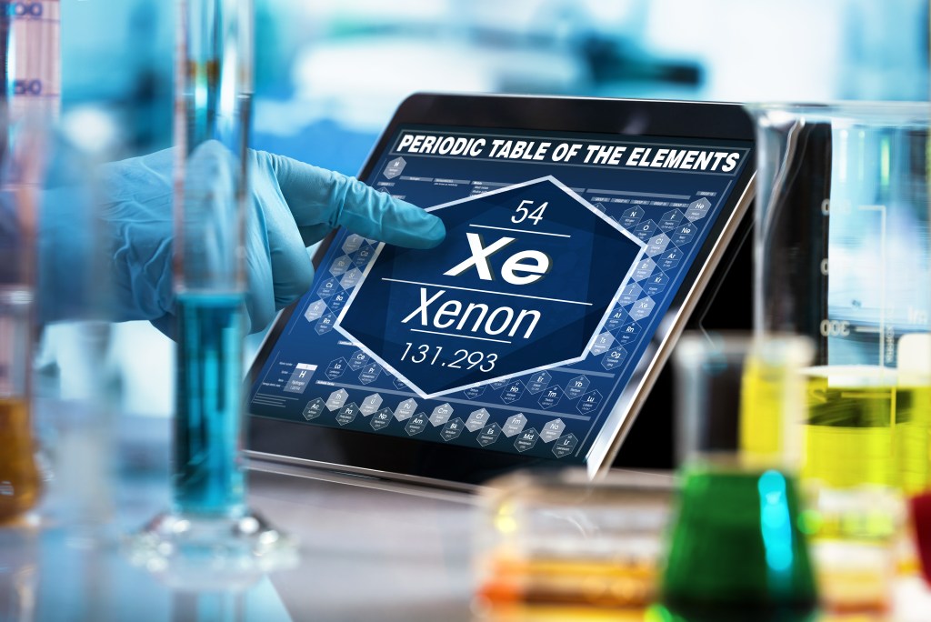 Xenon, a colorless, odorless and tasteless gas, has shown protective effects on the brain when inhaled by mice with Alzheimer's disease. A researcher holds a tablet with the word "xenon" on it.